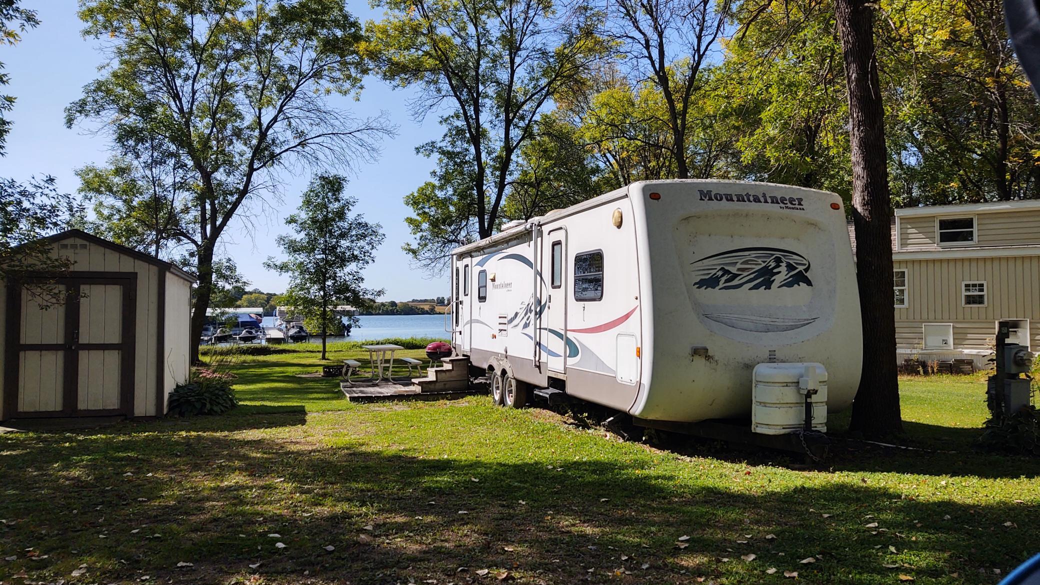 Unit 150 Lakeside Unit with older turn-key RV and Shed.