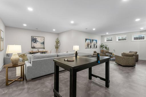 The lower level is perfect for recreation or relaxation, featuring a spacious 24 by 14 family room.