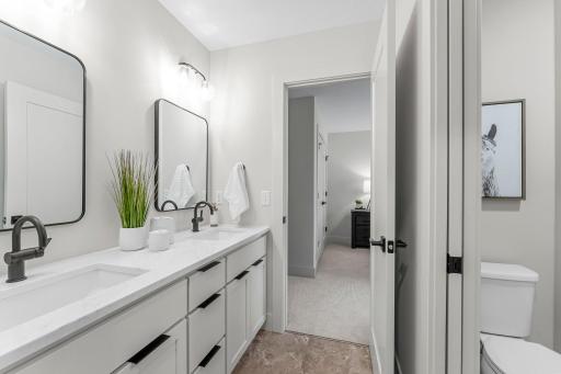 They are connected by a Jack and Jill bathroom, split designed for enhanced functionality.