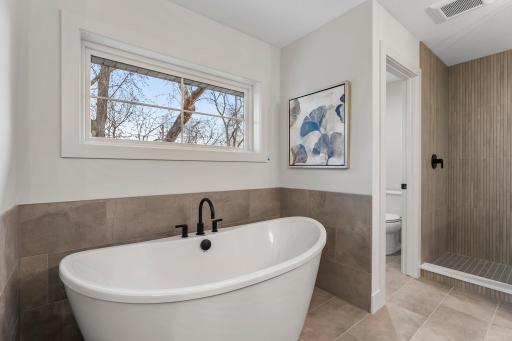 Additional features include the deep soaking tub and a linen closet for added storage.