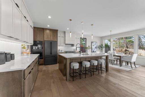 The kitchen is a showstopper, designed with entertaining and everyday living in mind.