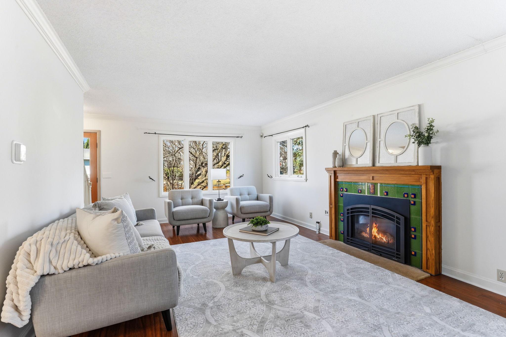 Main Level Living Room with gas fireplace and custom tile surround