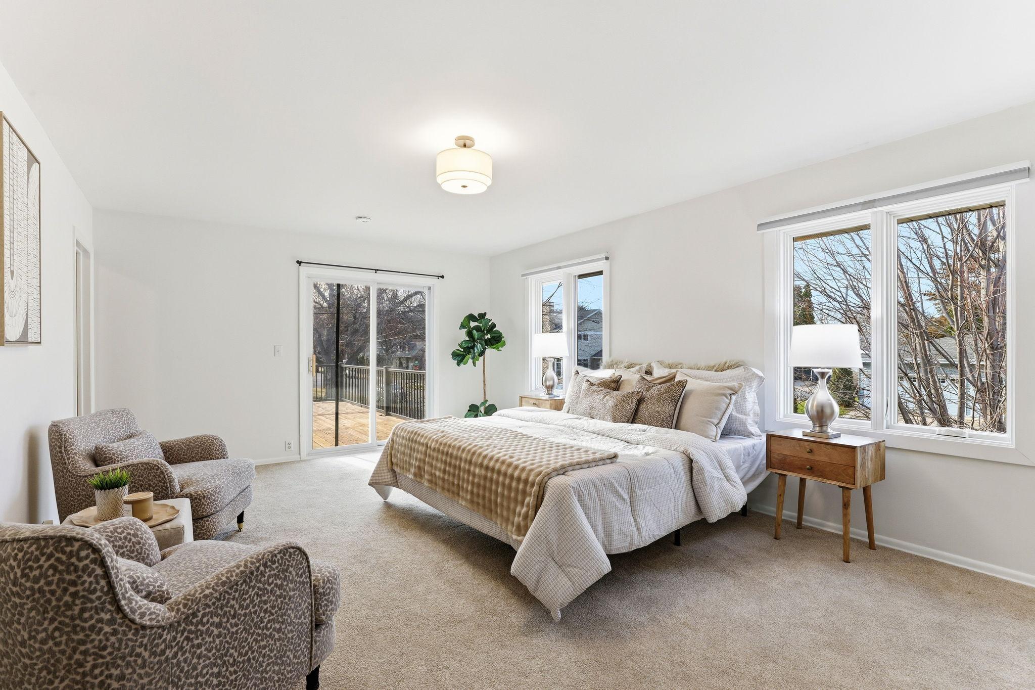 Upper Level Primary Bedroom #4 with sliding glass door to private balcony