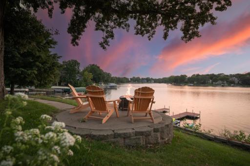 With panoramic water views, direct lake access, and a thoughtfully designed layout, this home is a true retreat for everyday living and entertaining.