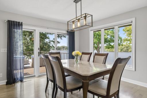 Sliding glass doors lead to a maintenance-free deckâoffering breathtaking lake views and front-row seats to unforgettable sunsets.