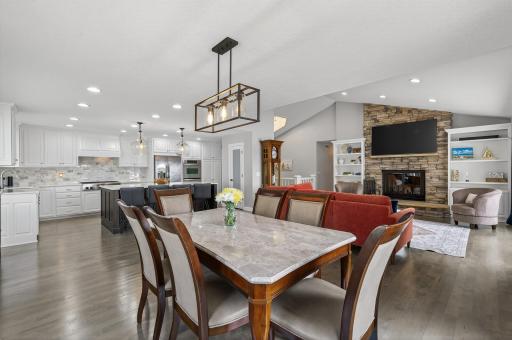 The open-concept design flows into the spacious dining area.