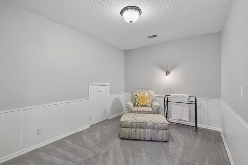A dedicated hobby room or office provides the perfect space for creative projects, remote work, or quiet retreat.
