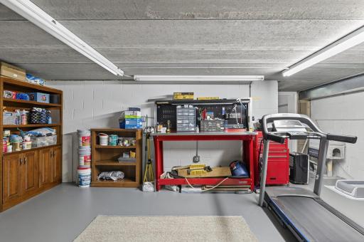 An expansive 21' x 20' storage room, located beneath the Spancrete garage floor, offers exceptional space for seasonal items, equipment, or long-term organizationâkeeping the rest of the home clutter-free.