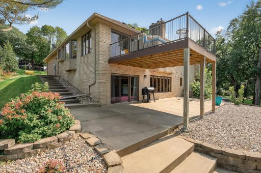 Step outside to the lakeside patio and enjoy effortless access to boating, swimming, and relaxing by the shore.