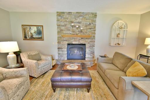 Floor to ceiling stone fpl. surround and hearth and