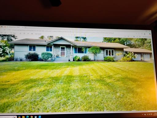 Huge front and back yards newer stone covered fr porch