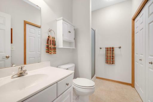 Main level guest bath with shower and washer/dryer