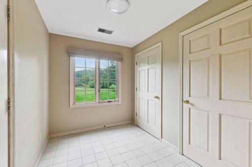 Entry from the garage with storage closets