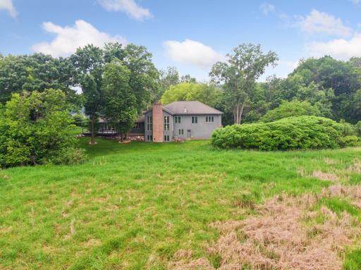Breathtaking aerial view from the back - showcasing the expansive landscape and lush greenery.