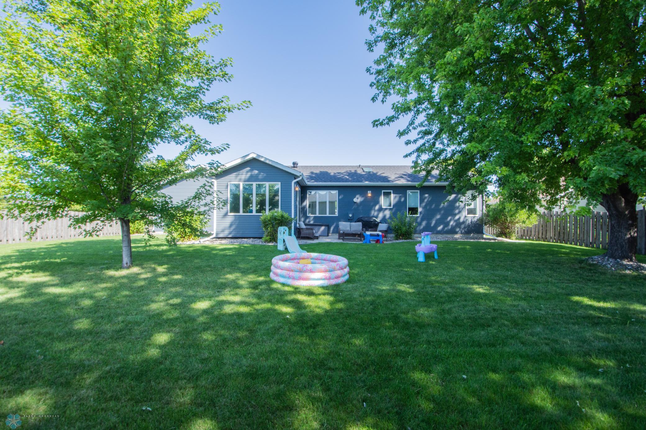 Fenced-In, Corner Lot!