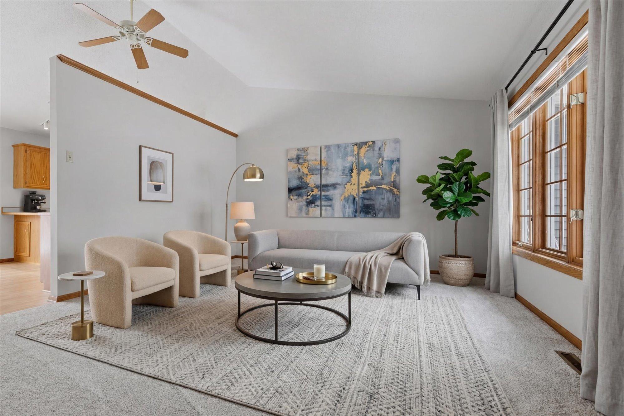 Main level living room. This photo has been virtually staged.