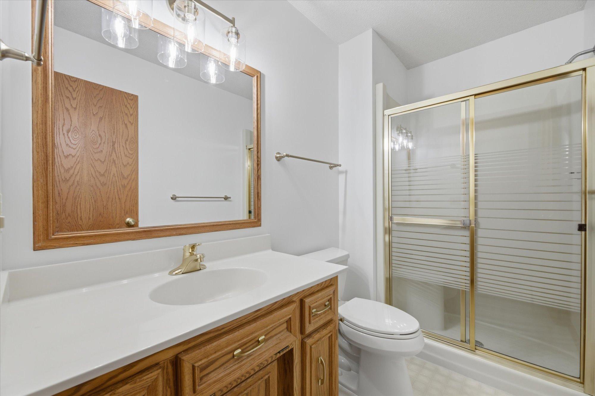 Primary Suite private 3/4 bathroom.