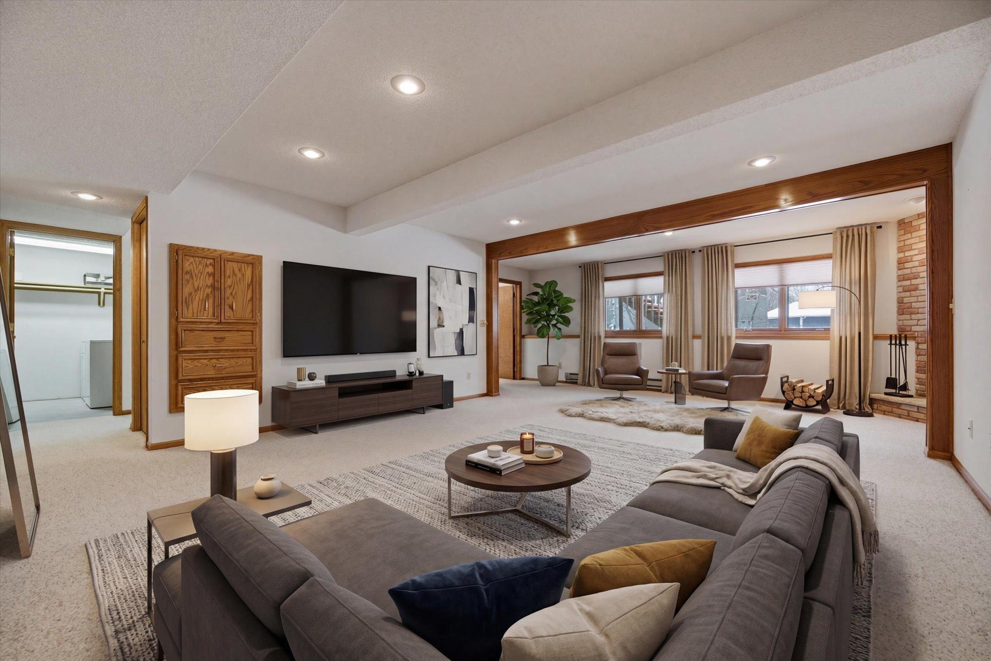 Lower level recreation room. This photo has been virtually staged.