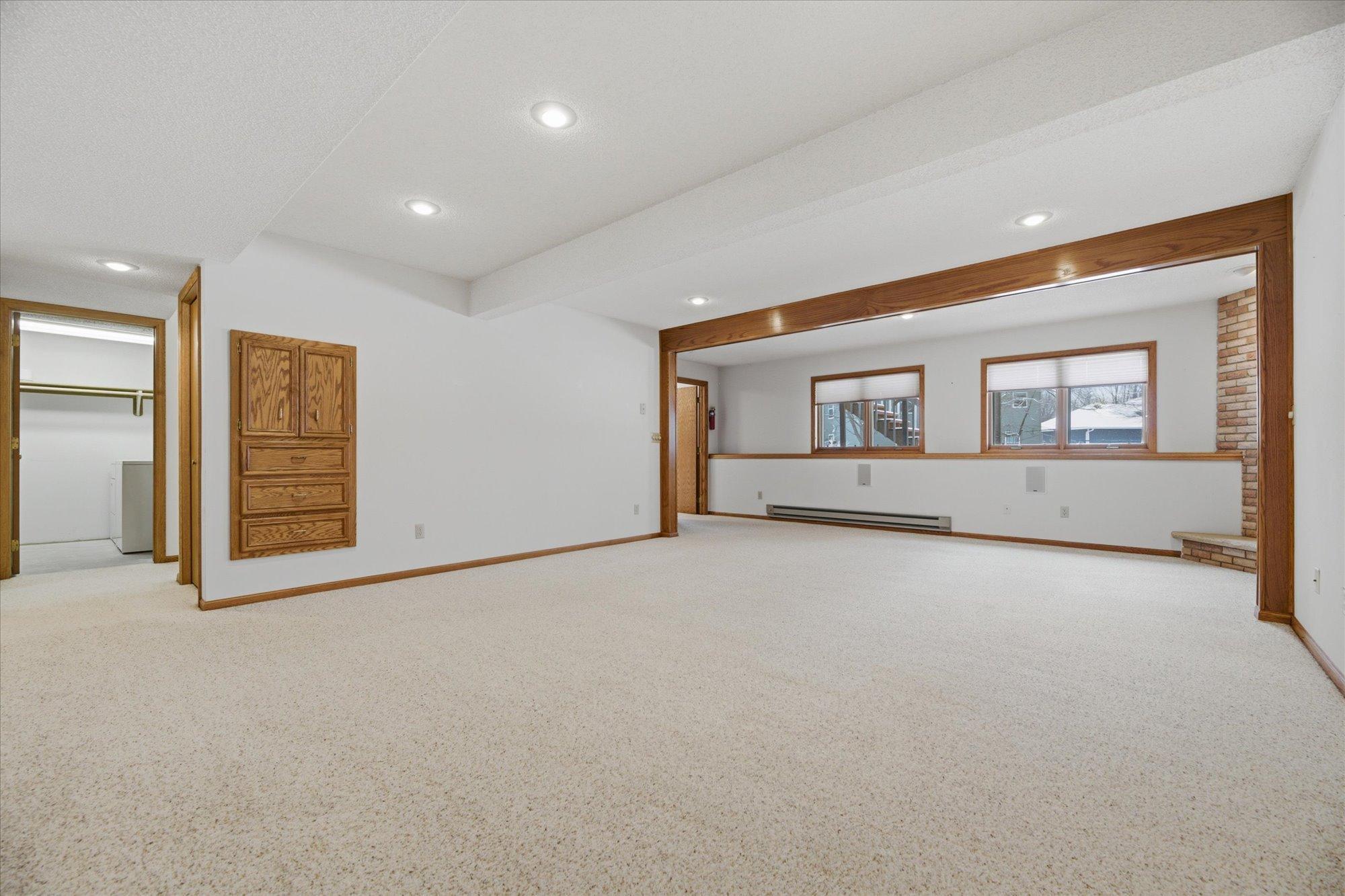 Dual lookout windows draw in ample natural, southern sunlight, overlook the backyard. Supplemental baseboard heat along with forced air.