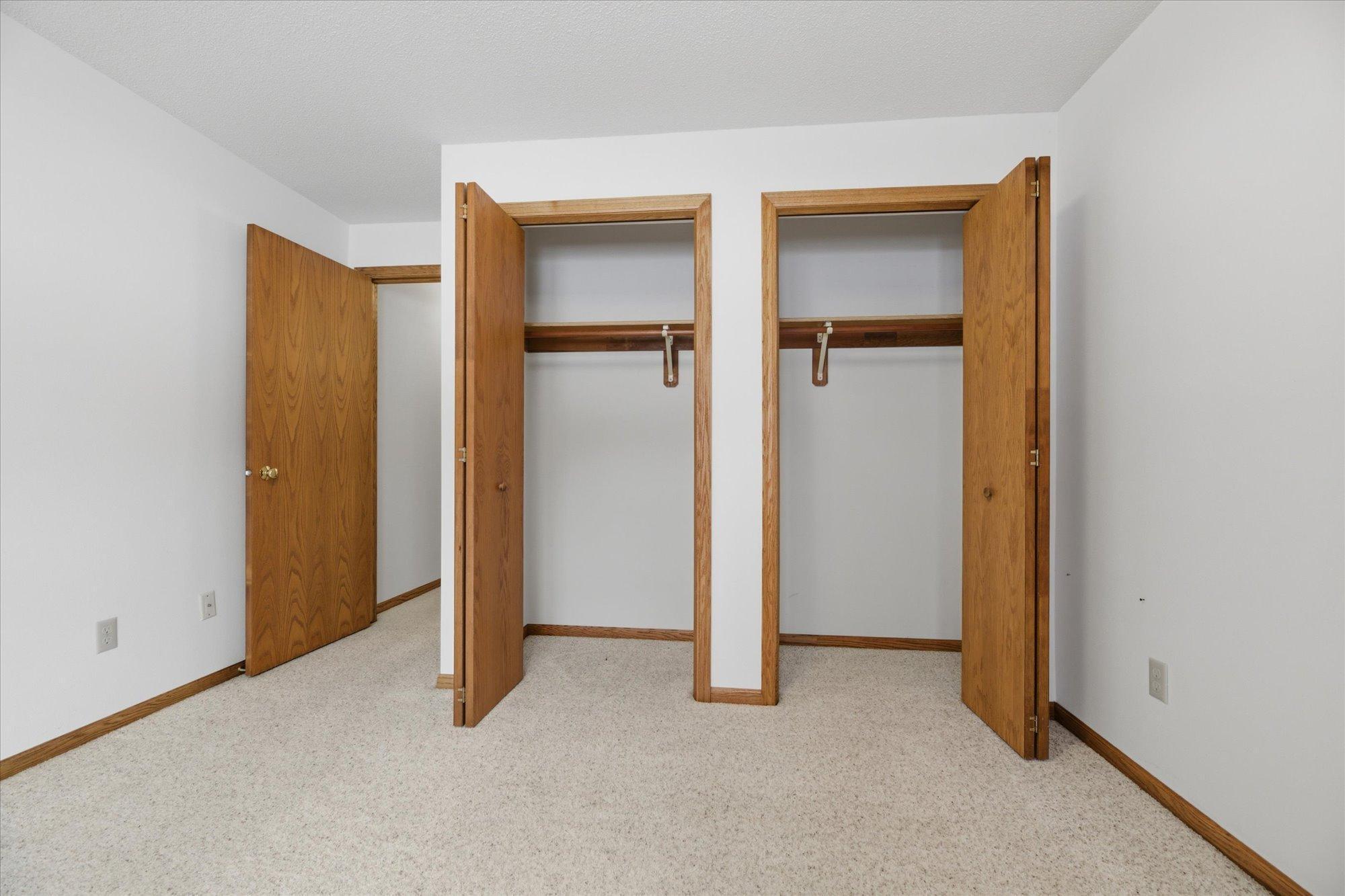 Dual closets, walk through to 3/4 bathroom.