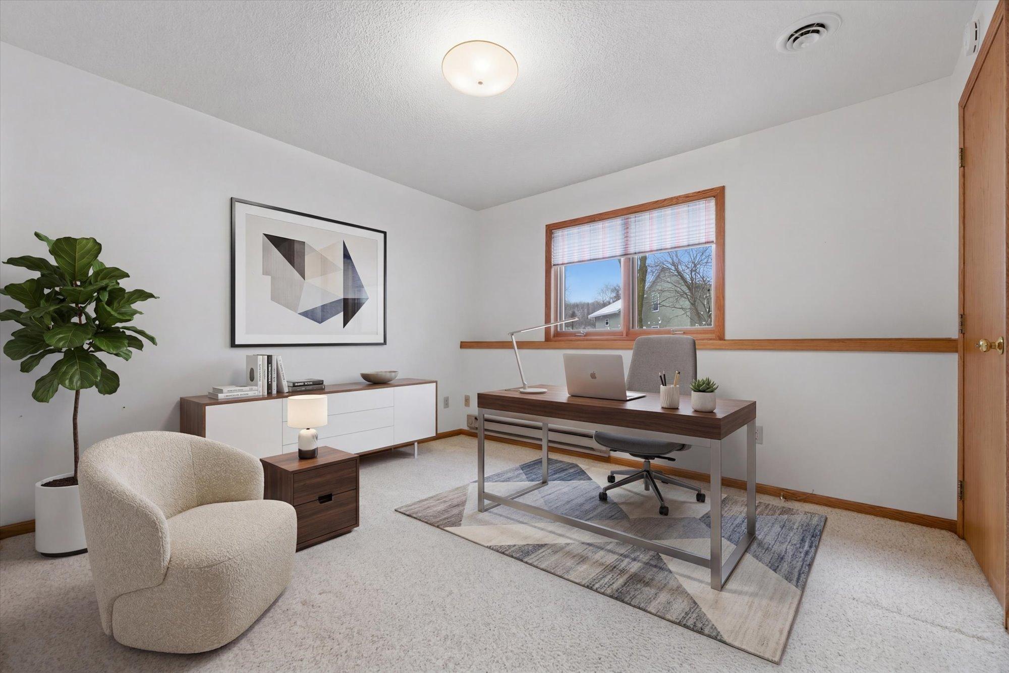 Lower level bedroom. This photo has been virtually staged.