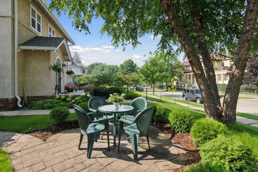 Quaint front patio with brick pavers facing the lake