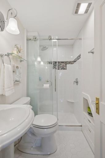 Primary suite bathroom in 2024 with beautiful tiled shower