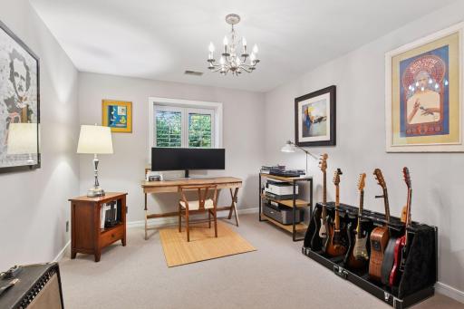 Lower-level office or studio space with abundant room for work, music, or creative pursuits