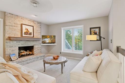 Cozy loft-level family room with fireplace and a comfortable retreat for relaxing or entertaining