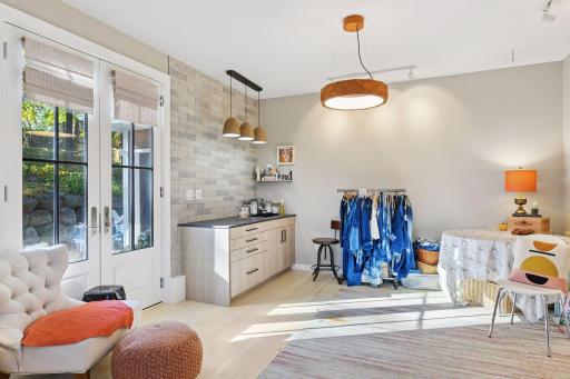 Light-filled studio adjacent to the garage, ideal for creative work, guests, or flexible living space