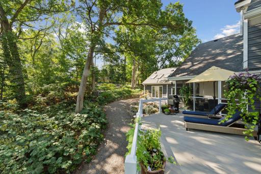 Lush gardens surround the inviting outdoor seating areas