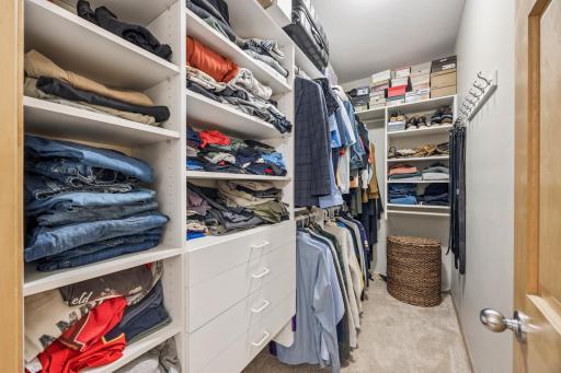 Owner's generous sized walk-in closet with built-ins for added convenience.