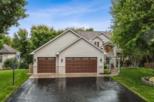 A spacious 3-car garage and a concrete apron give this home excellent curb appeal.
