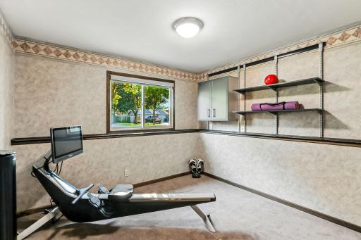 Lower 3rd bedroom being used as exercise room
