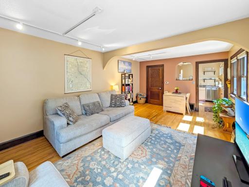 Living room features room for seating, entertainment, and informal dining. Unit 2811