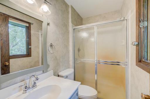 Private ensuite bath complete with a spacious walk-in shower