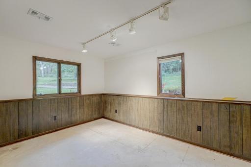 A spacious fifth bedroom on the lower level is perfect for guests or as a home office, transform it to suit your lifestyle!