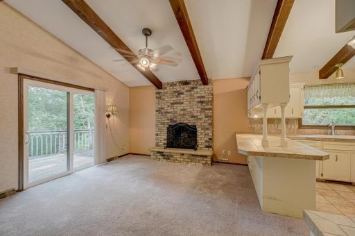 The beautiful vaulted beamed ceilings add character and create a spacious open dining and kitchen area