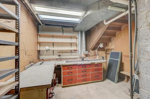 A bonus workshop is conveniently located inside the home, making projects easy and accessible!