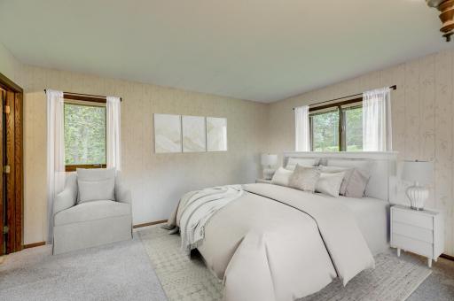 Relax in your spacious primary suite, complete with a private ensuite bath for your comfort and convenience