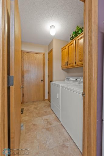 Laundry room view 1, access to the garage