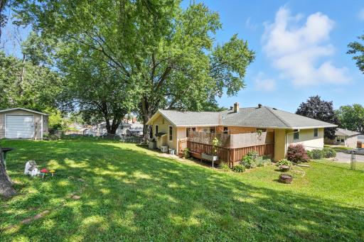 Extra large back yard all fenced in with a shed that is included. Fabulous deck off the main level family room