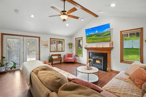 family room with gas fireplace and access to beautiful deck