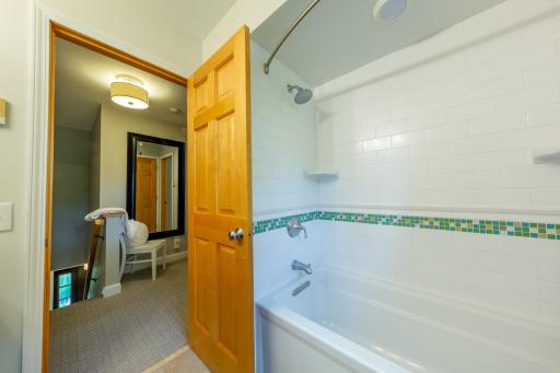 Upper Level Full Bath with Full Tile Surround Tub