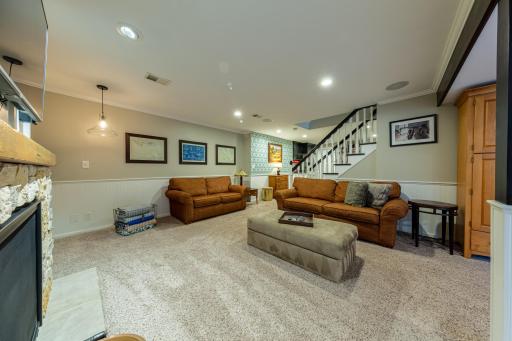 Lower Level Amusement Room with View of Staircase