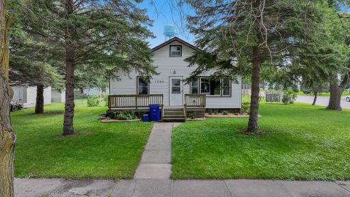 Very nice, welcoming front deck waiting for your personal touch - add a relaxing set of chairs and some seasonal outdoor decor!