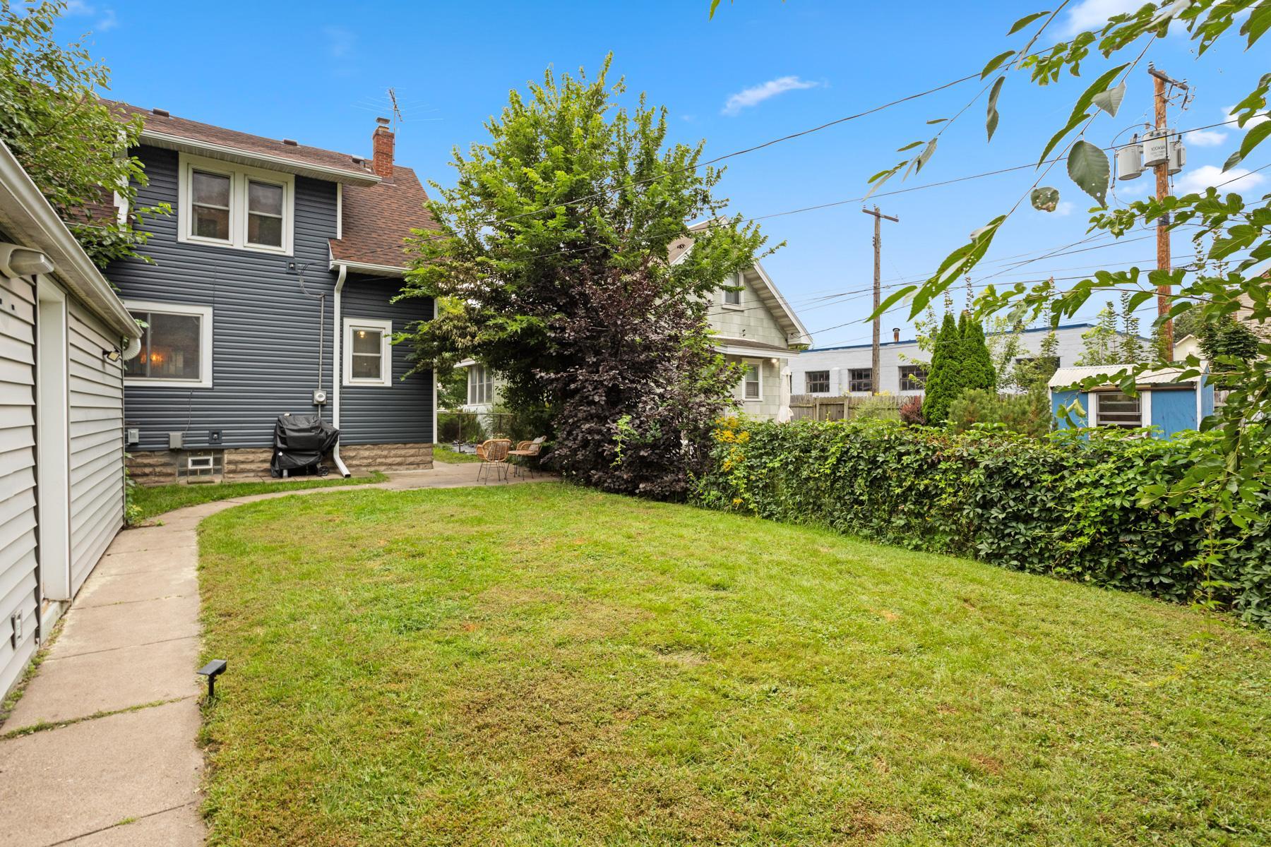 Private backyard with mature trees
