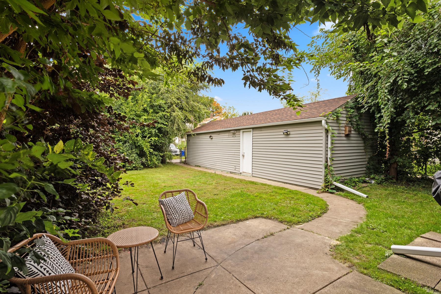 Patio with a fenced in yard