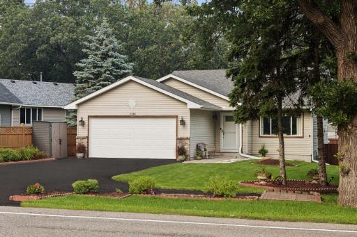 11380 West River Road, 2 Bedrooms, 2 bathrooms, 1400 Finished Square Feet, a 2 Car attached Garage, and a fully fenced-in Back yard.