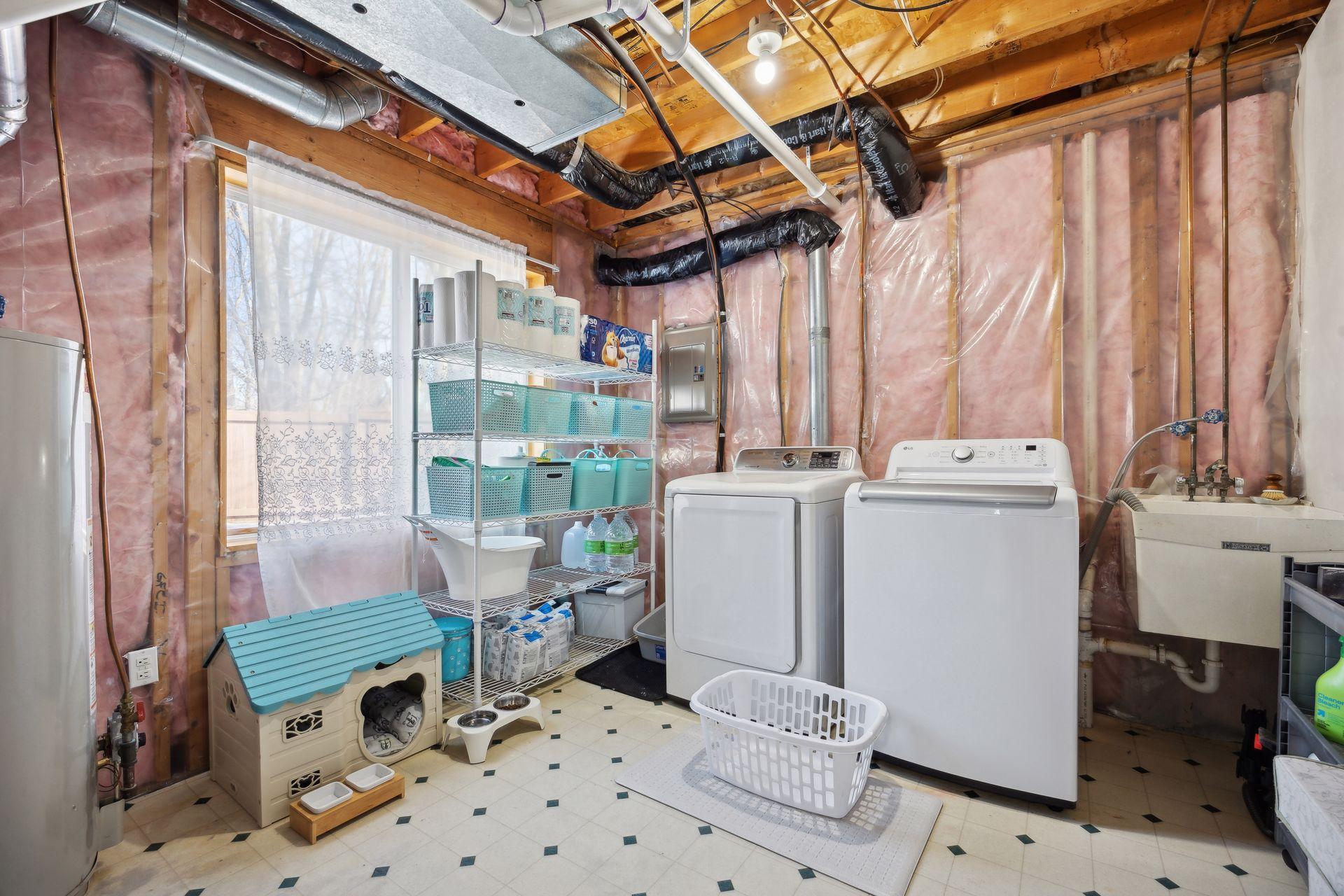 13x11 Laundry room/Mechanical room with extra storage.